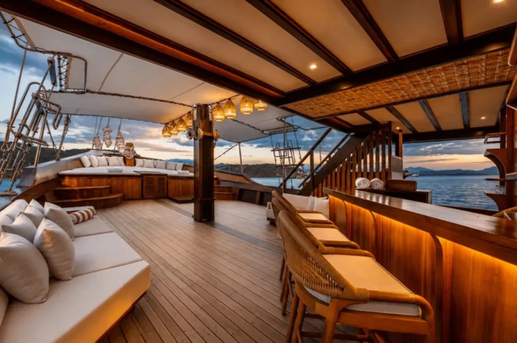 Indoor bar and lounge seating aboard the KAI Voyage phinisi
