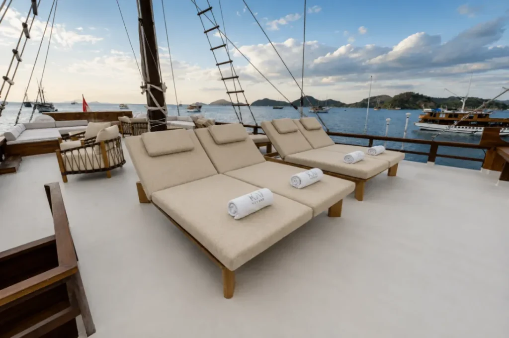 Top deck sun loungers and open-air space aboard KAI Voyage
