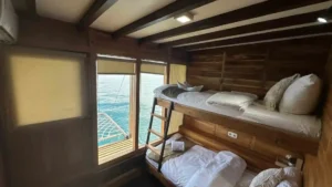 Ocean-view double cabin on Kaia with a private balcony and ensuite bathroom