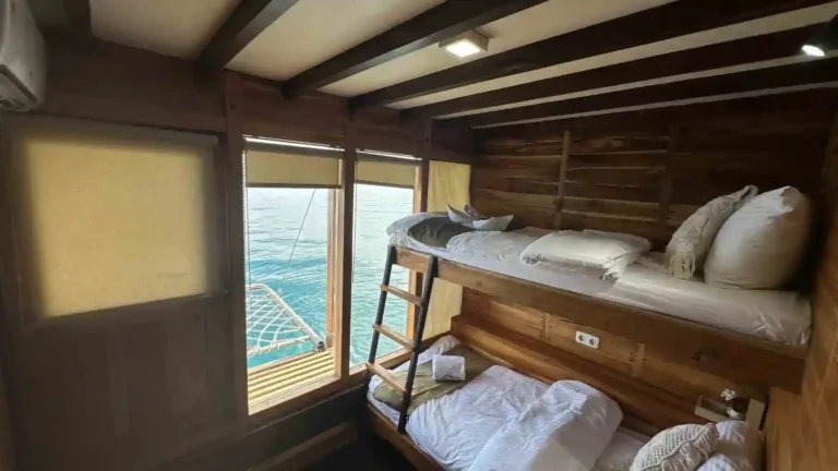 Ocean-view double cabin on Kaia with a private balcony and ensuite bathroom