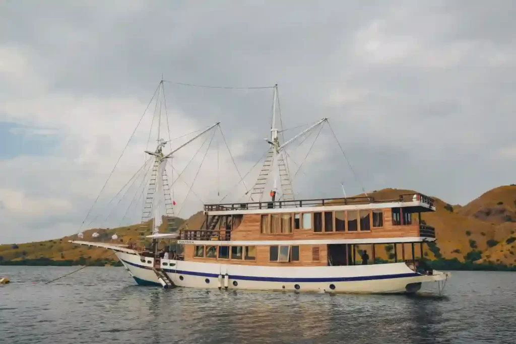 Kanthaka at anchor off an island in Komodo National Park