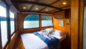 Panoramic 180 degree view cabin aboard La Unua by Kamma