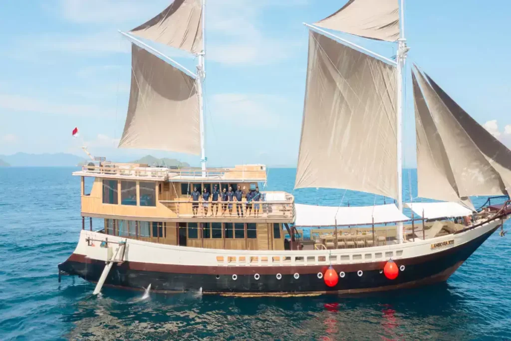 Side view of Lamborajo 2 phinisi on the water in Komodo