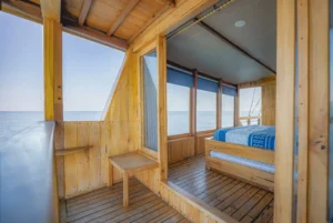 Private sea-view balcony beside a Master Ocean View cabin on Lamborajo 2