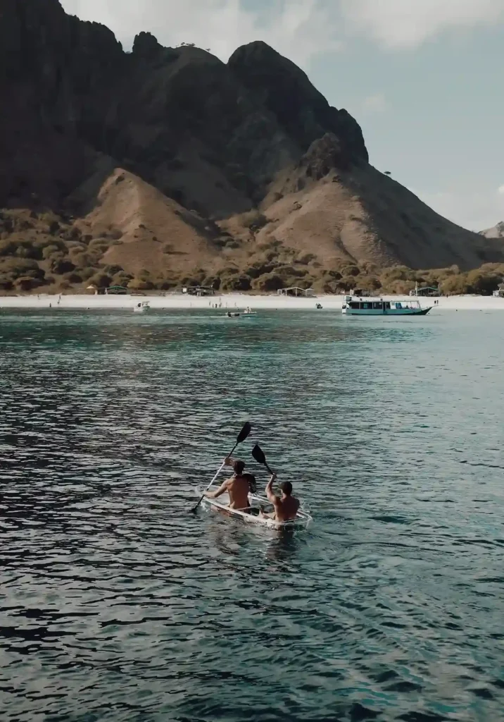 Guests kayaking near Lamborajo 3 in Komodo National Park