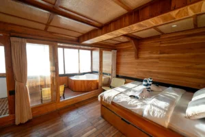 Master cabin opening toward a private jacuzzi on Lamborajo 3