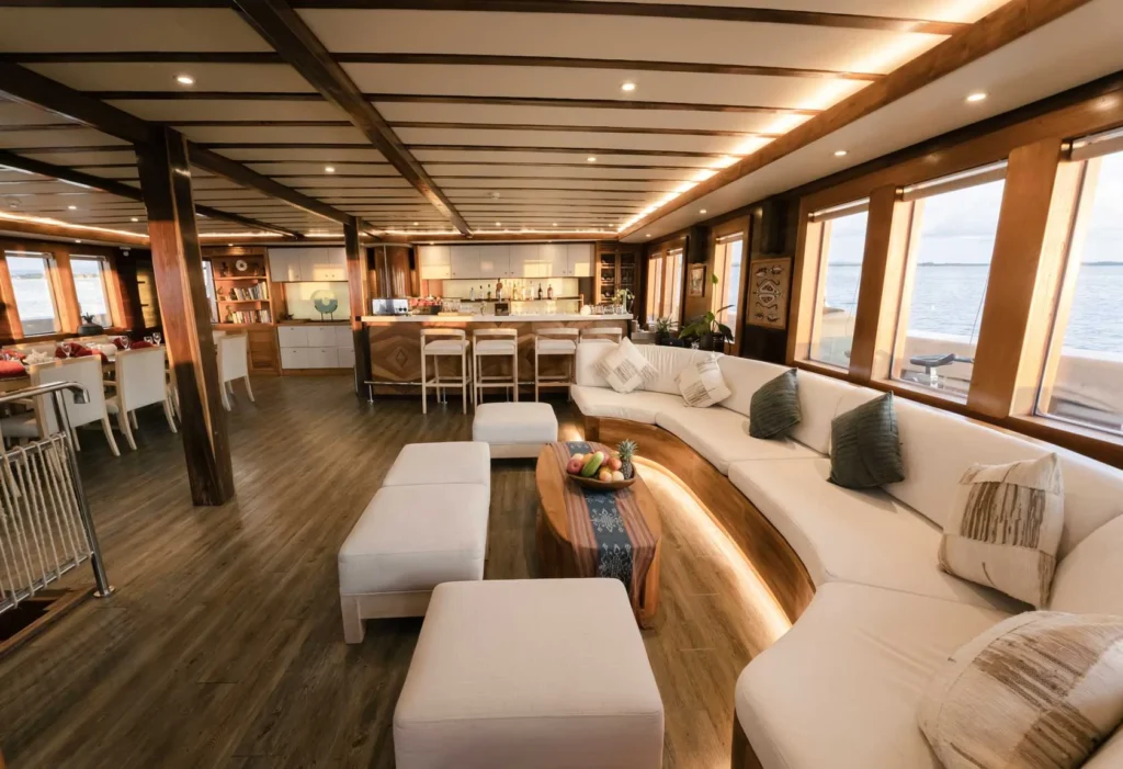 Indoor salon seating aboard Lamima