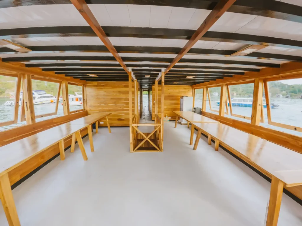 Indoor dining area aboard Maheswari phinisi