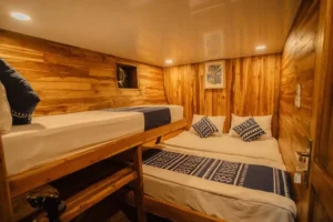 Double and single beds in Maipa Deapati lower Cabin 1