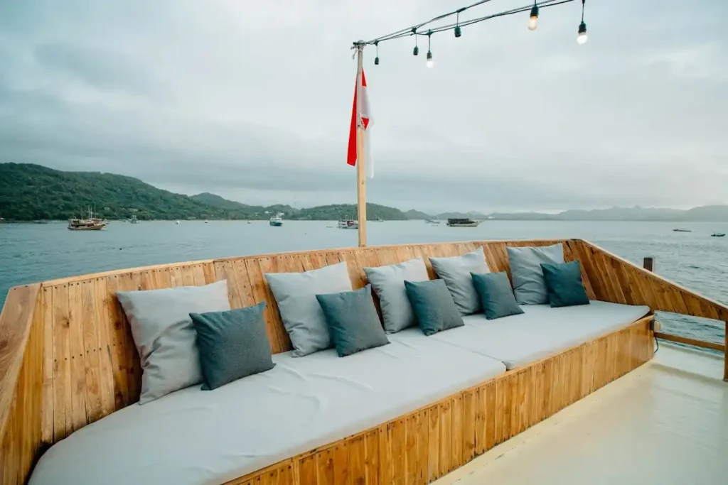 Cushioned sun deck lounge aboard Maipa Deapati