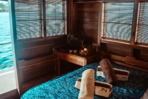 Sofa and windows in a Mikumba Dua master cabin