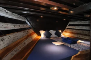 Double Cabin 1 aboard Moana Cruising, below deck with a double bed