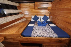 Double Cabin 2 aboard Moana Cruising, below deck with a double bed