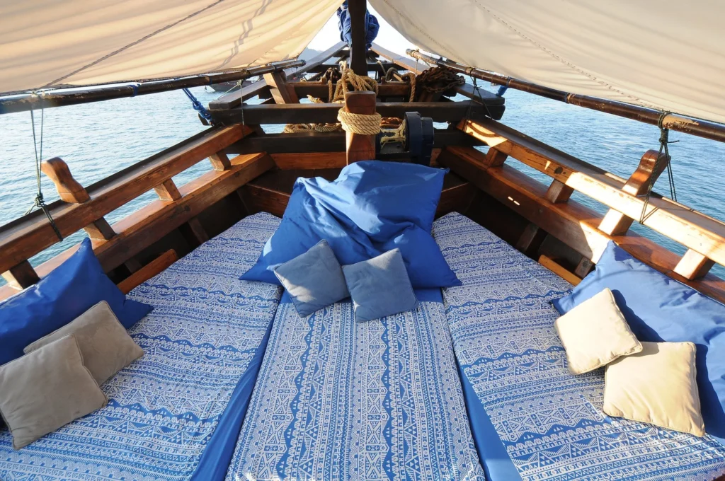 Shaded chill-out area on the sun deck of Moana Cruising
