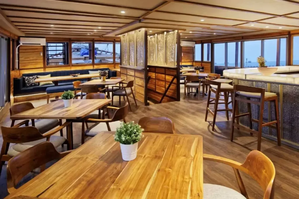 Air-conditioned restaurant on Mutiara Cruise where all meals are served