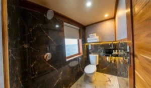 Private bathroom in the Coral Cabin aboard Naturalia Cruise