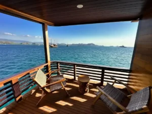 Private balcony and sea view from Mansard I aboard Neptune Cruise