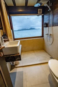 Private bathroom in an upper-deck cabin aboard Nusa Kembara