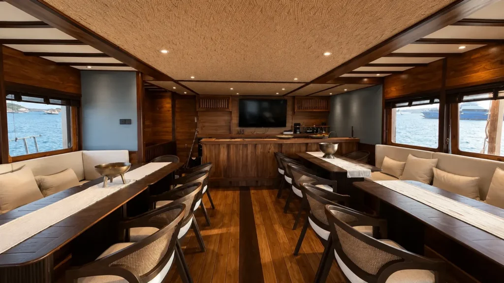 Indoor dining saloon aboard Papiton Allo phinisi