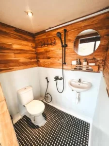 Bathroom serving the Pacific Room aboard Papiton Lopi