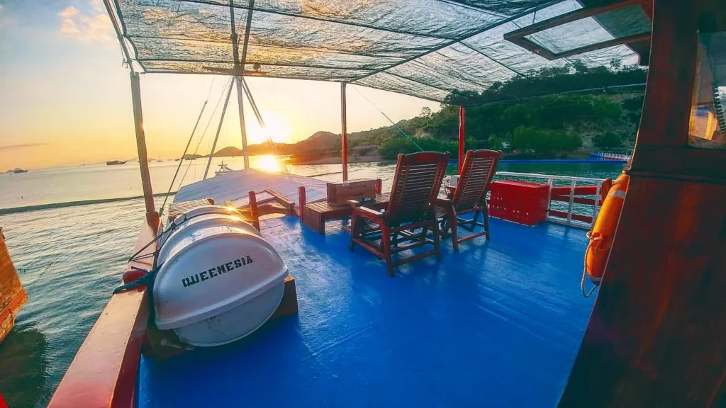 Top deck seating aboard Queenesia I at sunset
