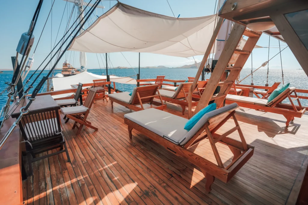 Sun loungers under shade sails aboard Queenesia II
