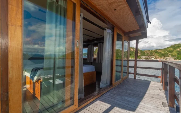 Master Cabin private balcony aboard Revfiero phinisi