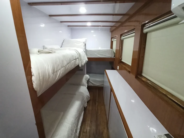 Four-berth shared bunk cabin aboard Riley phinisi