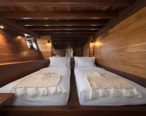 Twin-bed configuration in the lower-deck Guest Cabin aboard Sanya yacht
