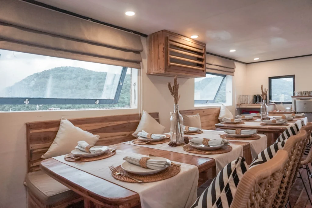 Wooden dining space aboard Sea Familia 1