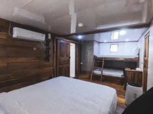 Double bed and bunk arrangement in the Family Cabin aboard Sea Familia 2