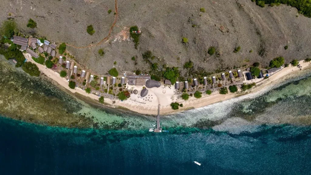 Aerial view of Sebayur Island and its surrounding reef flats near the Komodo National Park boundary