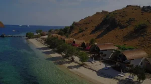 The white sand beach and sheltered bay on Sebayur Island