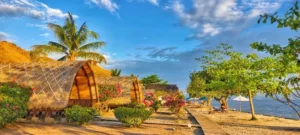 Bungalows set back from the shoreline on Sebayur Island