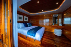 Double bed in an upper-deck Seven Angel VIP cabin