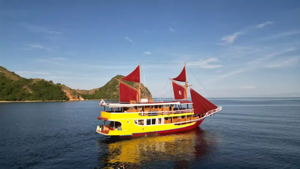 Singkolo phinisi viewed from the water in Komodo