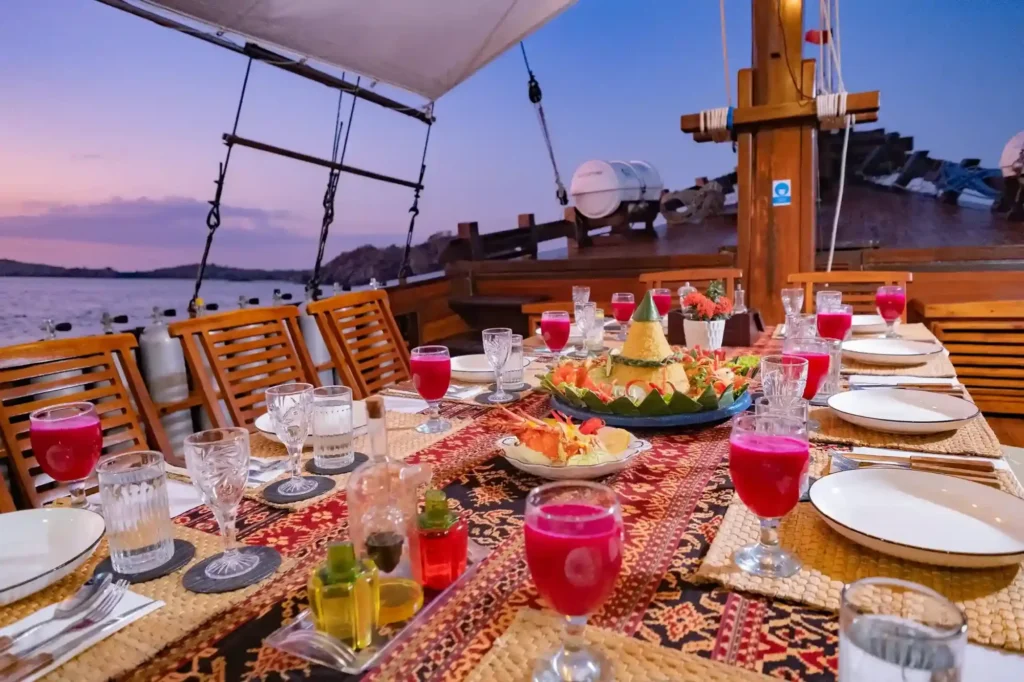 Outdoor dining area aboard Supraba phinisi