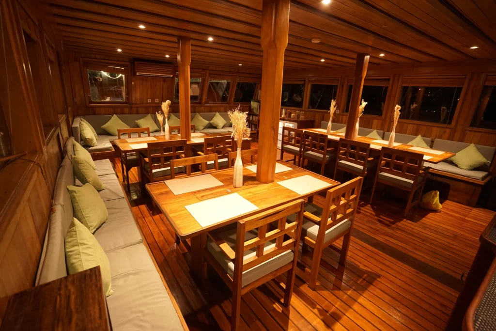 Salon aboard Tambora, split between dining and lounging sections