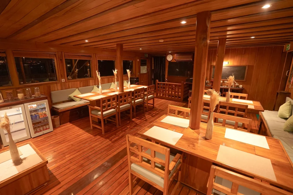 Dining table set for a meal aboard Tambora