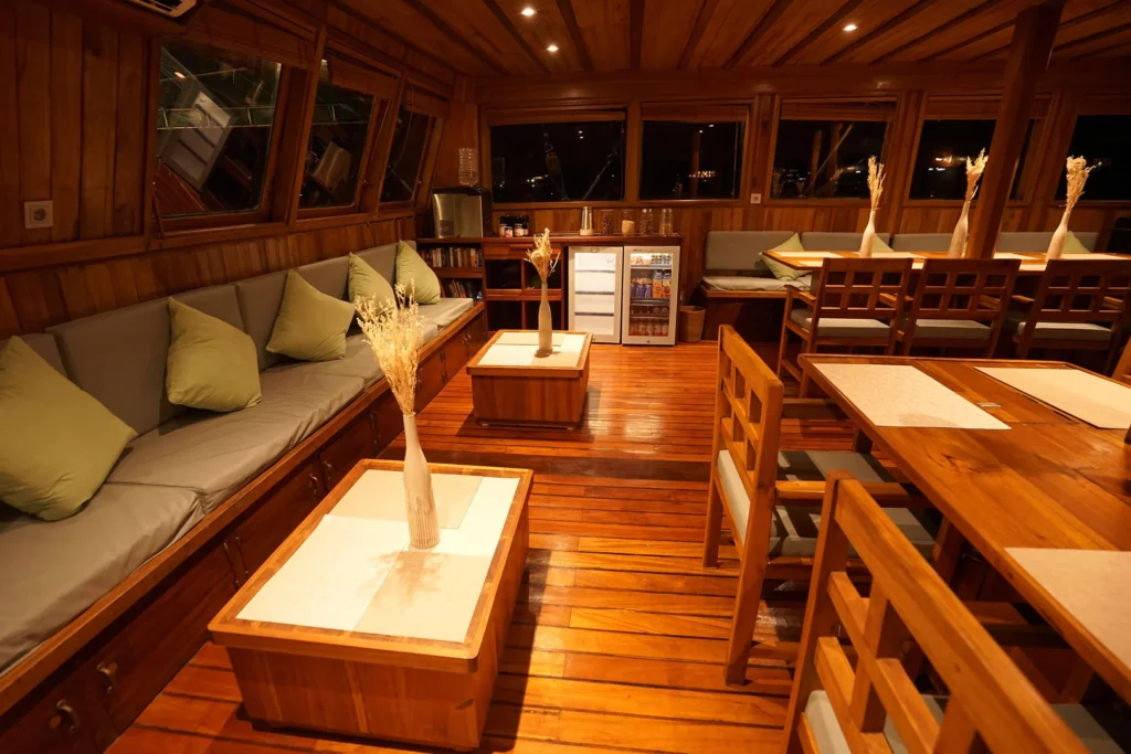 Seating in the indoor lounge aboard Tambora
