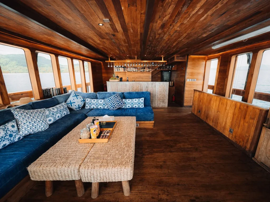 Indoor sea-view lounge aboard The Oracle yacht