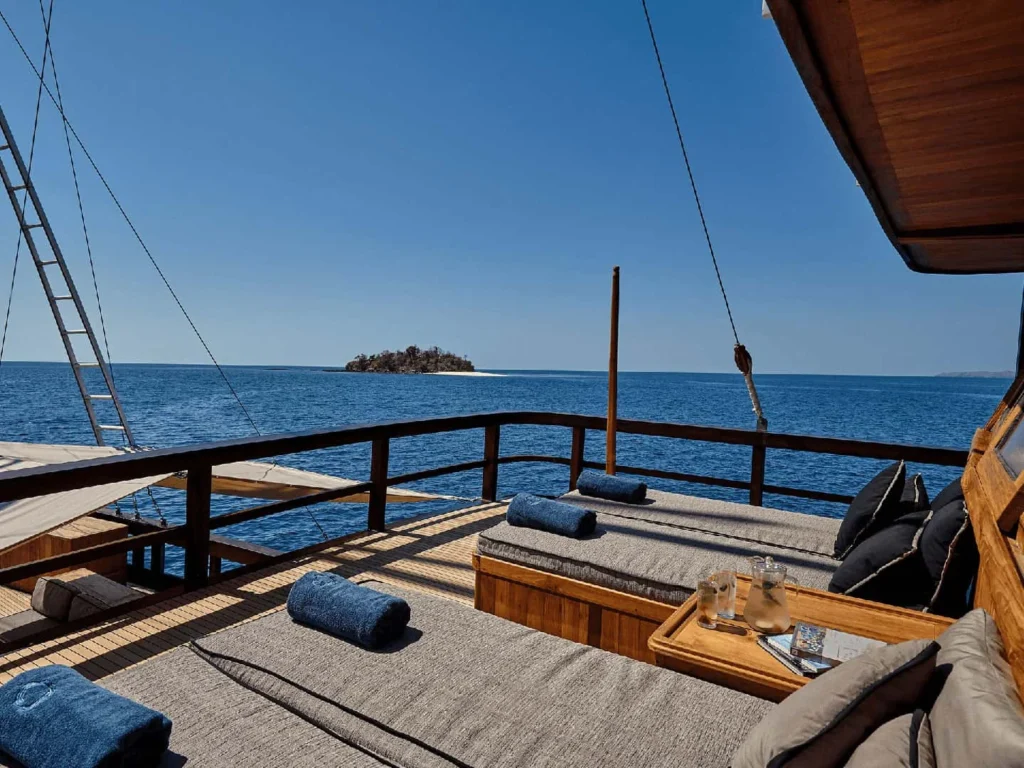 Open-air ocean-view lounge aboard The Oracle yacht