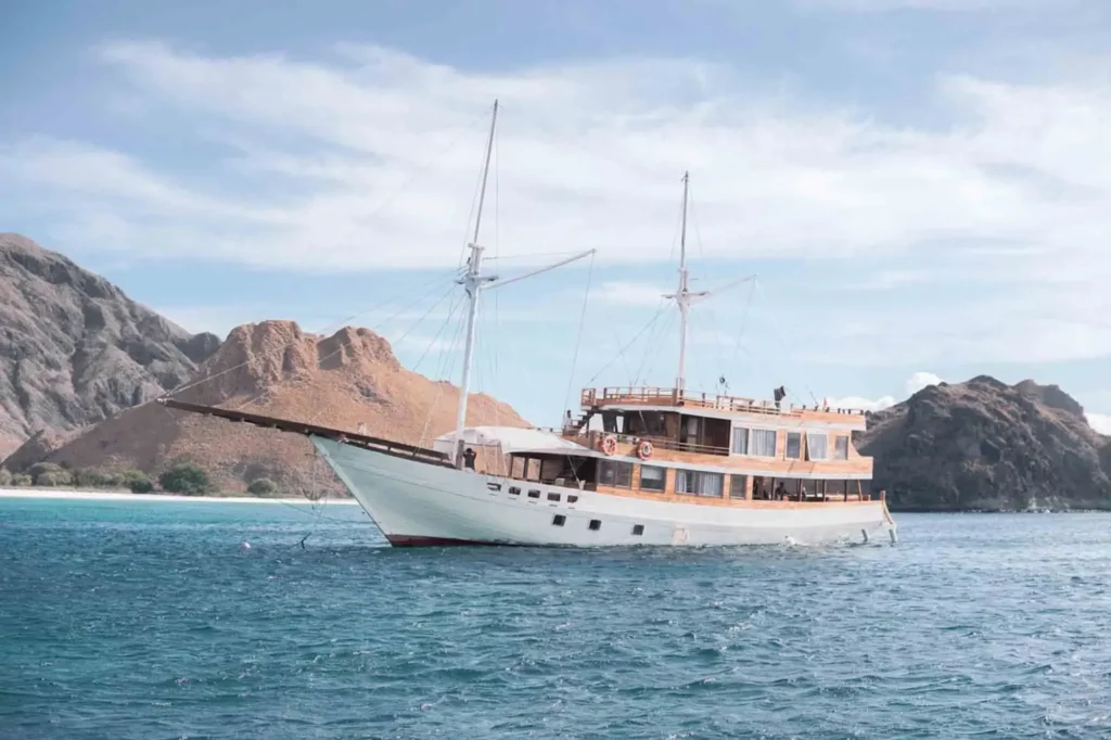 Yumana, a 32-metre phinisi sleeping twenty-five guests, in Komodo National Park