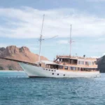 Yumana, a 32-metre phinisi sleeping twenty-five guests, in Komodo National Park