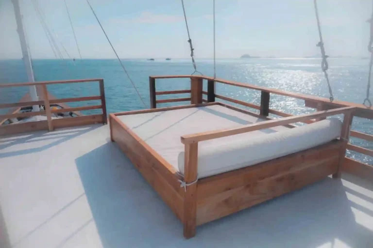 Royal Suite on the upper deck of Yumana with queen bed and private balcony