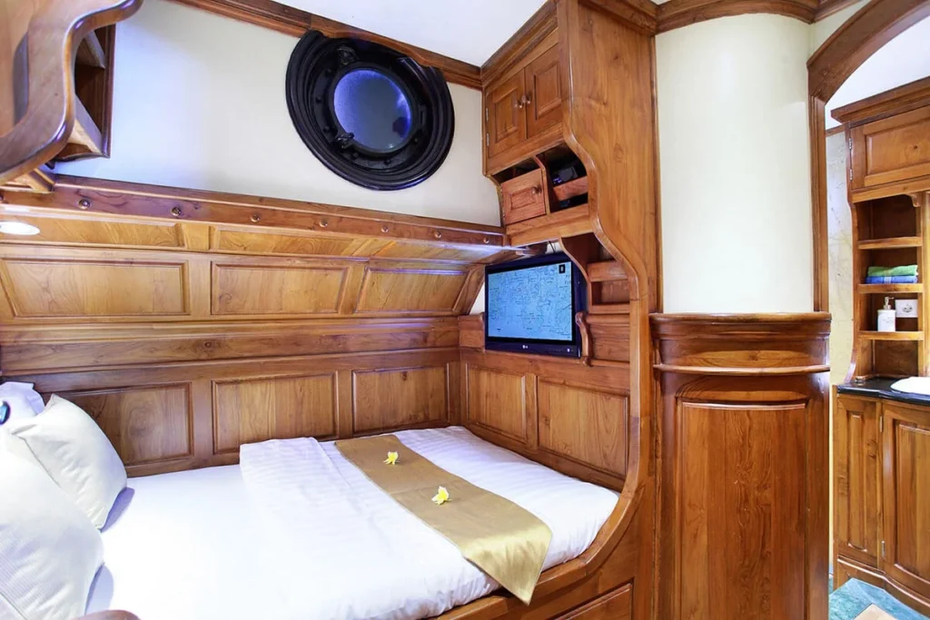 Double bed inside Adelaar Stateroom four