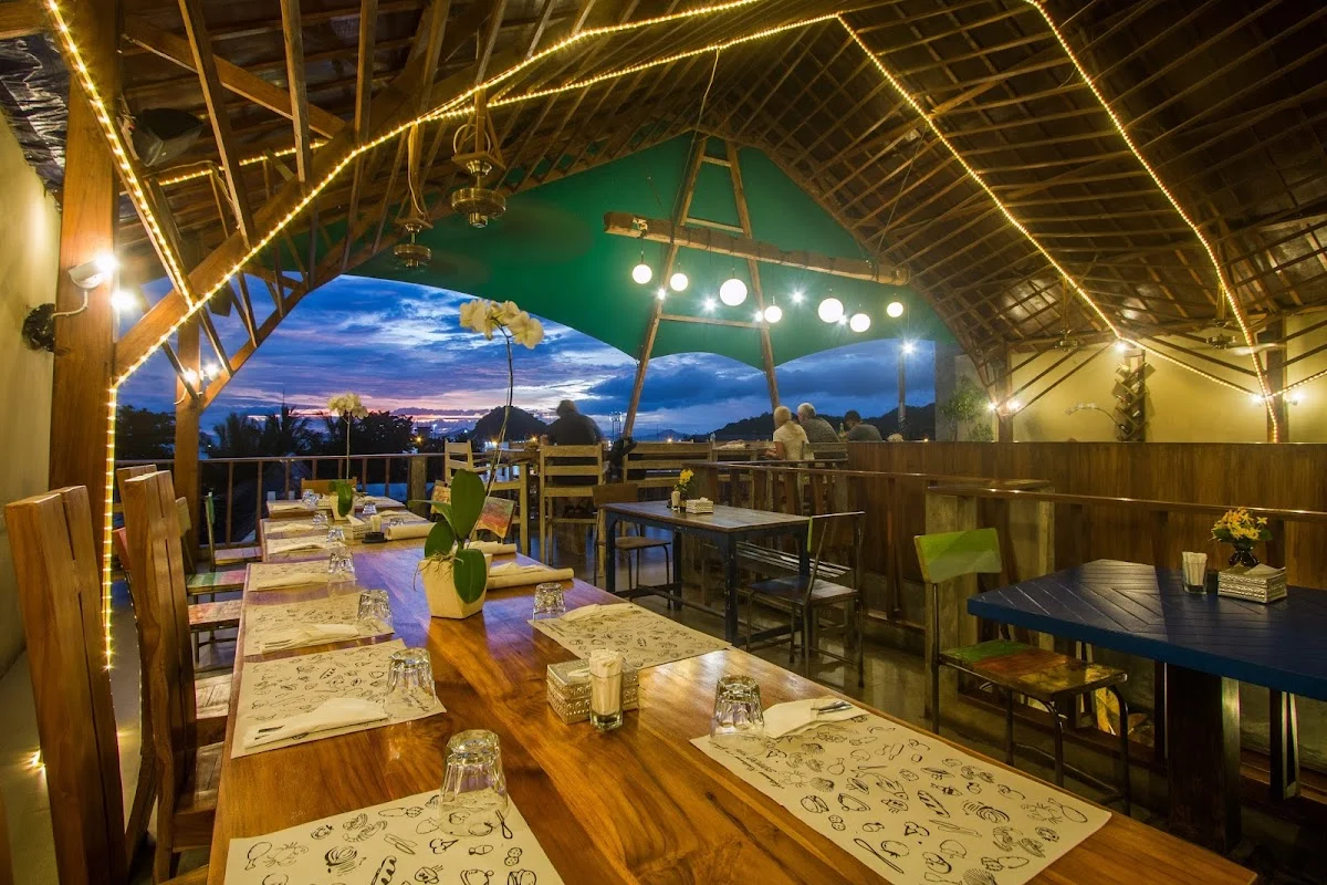 Artomoro Restaurant and Grill cover showing the restaurant setting in Labuan Bajo