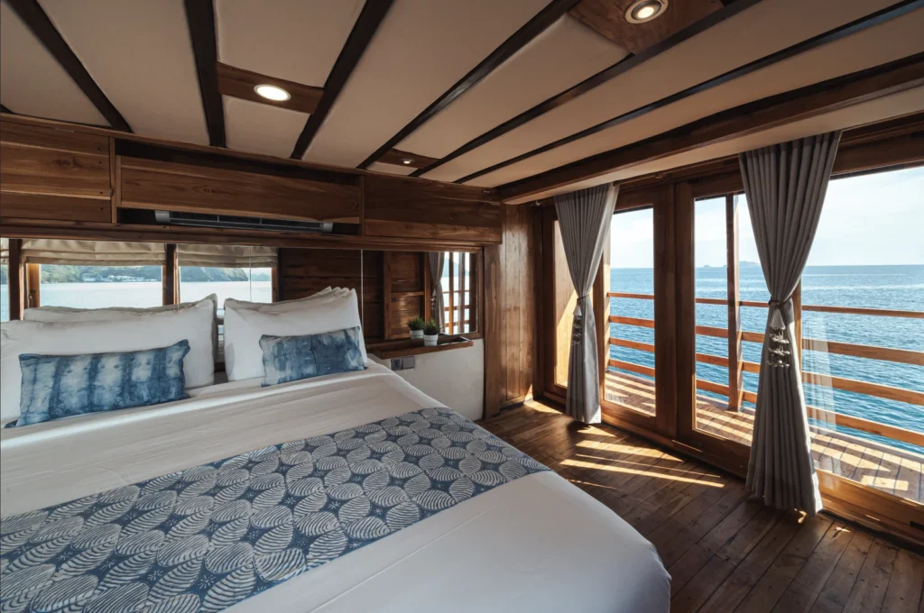 Double cabin with private balcony and sea views aboard Augustine