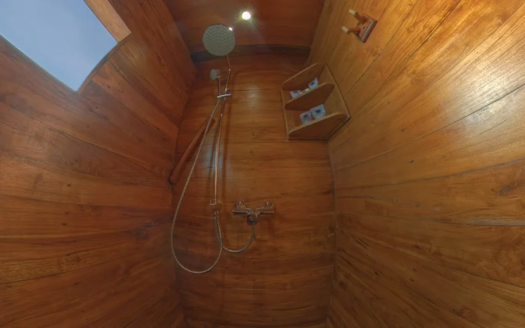 Private ensuite shower in a Damai II Master Stateroom