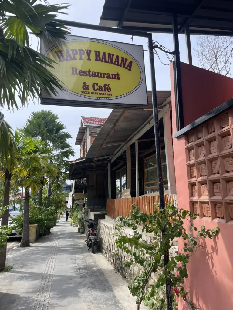 Happy Banana Komodo cover showing the restaurant setting in Labuan Bajo